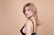 © Volodymyr - Sensual woman in black bra. Beautiful blonde girl in sexy black lingerie. Female bra.