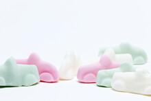 Many Candy Cars In Three Different Flavors On White Background