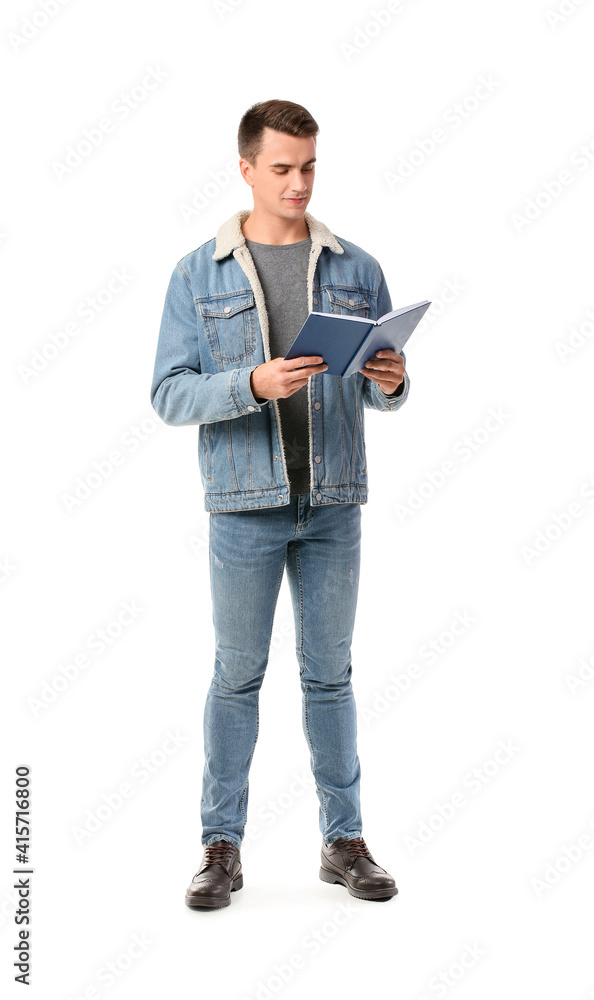 Young man reading book on white background