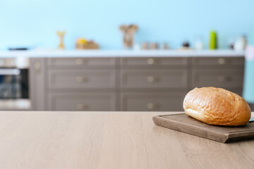 Canvas Print - Fresh bread on table in modern kitchen