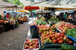 © Anna - Tomatoes in a Market scene in Braga Portugal in summer.