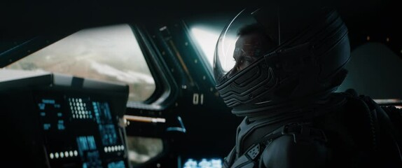 portrait of caucasian male astronaut inside spaceship cockpit. sci-fi space exploration concept. sho