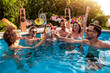 © ivanko80 - Group of friends have pool party