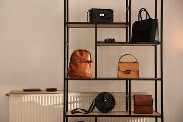 Collection of stylish women's bags and accessories in luxury boutique