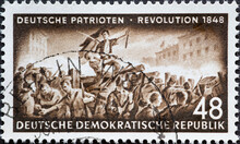 GERMANY, DDR - CIRCA 1953 : A Postage Stamp From Germany, GDR Showing Barricade Fighting During The Revolution Of 1848/49 Text: German Patriots