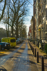 Wall Mural - Street view of typical road and house in Amsterdam, Netherlands.