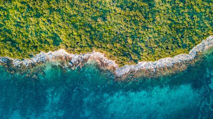 Sticker - Drone view of the beach with lush vegetation in Pula Croatia