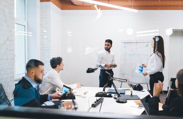 Wall Mural - Multiethnic colleagues having meeting in office