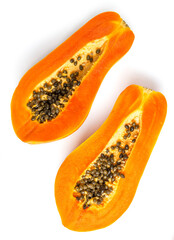 Wall Mural - half of ripe papaya fruit with seeds isolated on white background. full depth of field