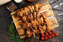 Grilled Or Barbecue Chicken Wings Skewer On Board