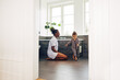© Flamingo Images - Young mom playing with her little girl in their bathroom