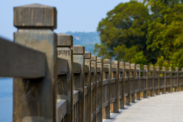 Canvas Print - Close-up of the fence of the lakeside trail