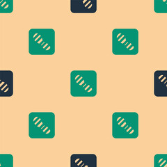 Wall Mural - Green and black Human footprints shoes icon isolated seamless pattern on beige background. Shoes sole. Vector.