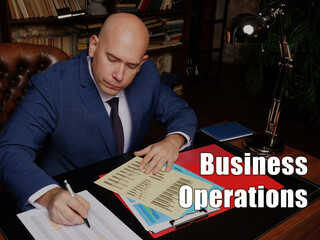 Legal concept meaning Business Operations Businessman, executive manager hand filling paper business document