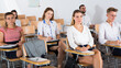 © JackF - Portrait of modern young people listening to training session in auditorium ..