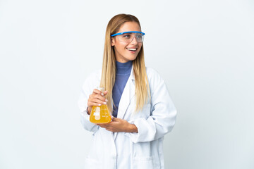 Wall Mural - Young scientific woman isolated on white background looking side