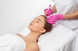 © Dimid - Cosmetologist does prp therapy against hair loss and anti-dandruff of a beautiful woman in a beauty salon. Aesthetic cosmetology concept, hair treatment.