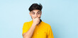 © luismolinero - Arabian handsome man over isolated background having doubts and with confuse face expression