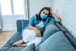 © SB Arts Media - Lonely woman suffering from depression at home during coronavirus lockdown and social distancing