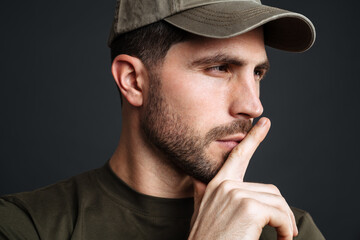 Wall Mural - Close up of a handsome pensive young military man