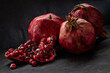 Ripe juicy pomegranate and its parts
