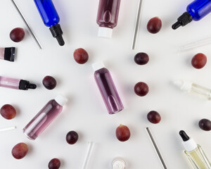 Organic bio grape cosmetics. Extract, grape seed oils, serum. Abstract cosmetic laboratory. Flat lay