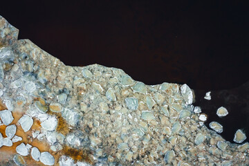 Wall Mural - Beautiful view of frozen seawater and ice texture in winter, Ice floes in Baltic seawater.