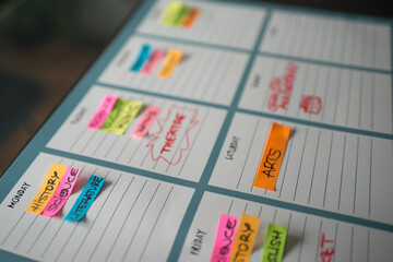Colorful weekly timetable for scholar classes and freetime with colorful posts and handwritten subjects. White background
