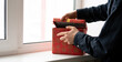 © Mihail - person open the gifted present box and check whats inside, surprise on the holidays