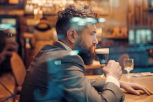 Alone Man Rest In Restaurant. Businessman With Long Beard Drink In Club. Serious Customer Sit In Cafe Bar Drinking Ale. Date Meeting Of Hipster Awaiting In Pub.