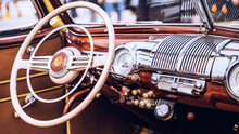 Classic Car And Steering Wheel With Wooden Interior