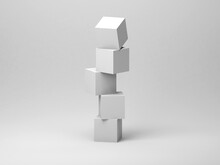 Abstract Tower Installation Of Five White Cubes In An Empty Studio