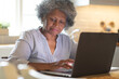 © Wavebreak Media - Thoughtful african american senior woman using laptop at home