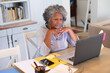 © Wavebreak Media - Thoughtful african american senior woman having a video call on laptop at home