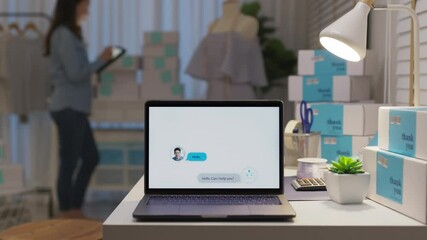 Chatbot conversation on laptop screen app interface with artificial intelligence technology providing virtual robotic assistant customer support and information for small business SME B2C concept.