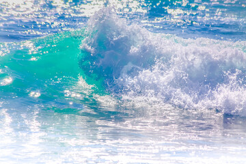 Wall Mural - Close-up of sea waves splashing on shore