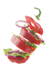 Canvas Print - Creative layout made of bell pepper, cucumber and salad leaves.Food concept.