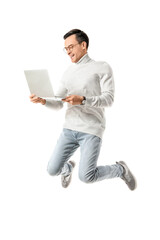 Jumping man with laptop on white background
