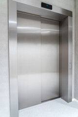 three close elevator in the hall