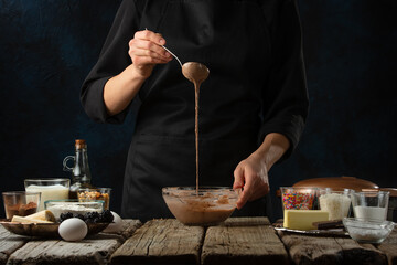 Chef preparing chocolate dough for baking, culinary recipes, making sweets, recipe book and cooking