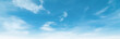 © Art Stocker - Summer Blue Sky and white clouds background. Beautiful clear cloudy in sunlight spring season. Panorama vivid cyan cloudscape in nature environment. Wide horizon skyline with spring sunshine.