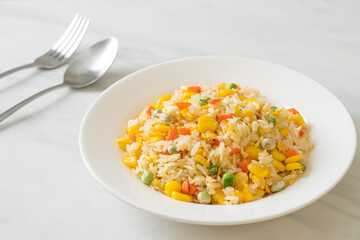 Wall Mural - fried rice with mixed vegetable (carrot, green bean peas, corn) and egg