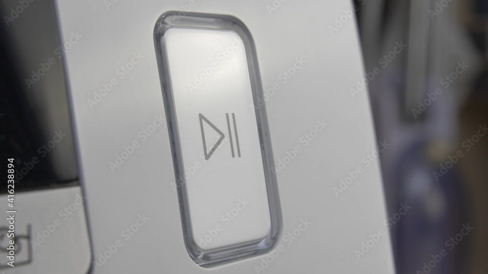 Pressing Play Pause Button on the Device Multiple Times Close-Up Stock ...