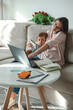 © perfectlab - Concept work at home and home family education, mother working with son multitasking