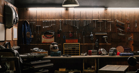 workshop scene. old tools hanging on wall in workshop, tool shelf against a table and wall, vintage 