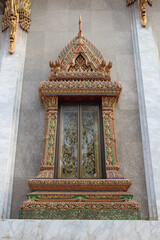 buddhist  temple (wat intharavihan) in bangkok (thailand)