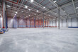 © liiset - warehouse or hangar. Industrial building interior consist of polished concrete floor and closed door for product display or industry background.