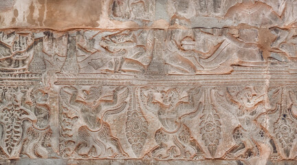 Wall Mural - Design of historical walls with mistical animals of Angkor What temple, 12th century Khmer landmark. Cambodian complex and UNESCO World Heritage Site