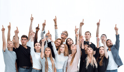 large group of young people pointing up