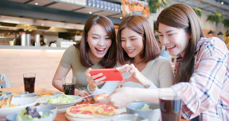 Wall Mural - females take food picture